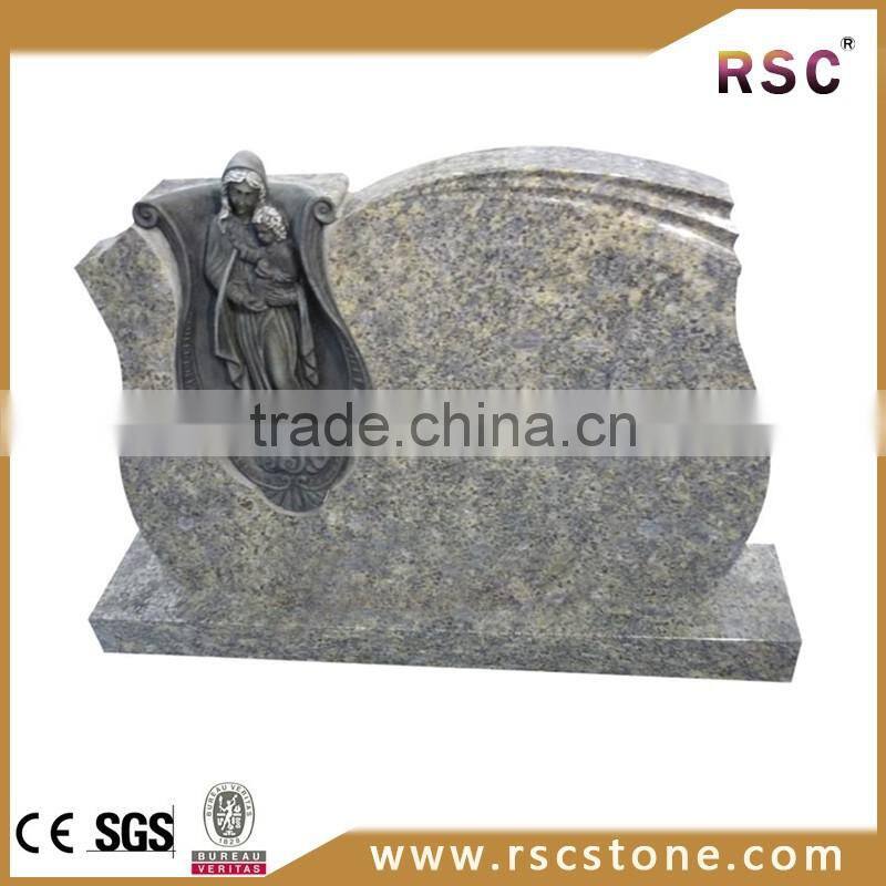 Grey headstone with angel wings , angel headstone designs