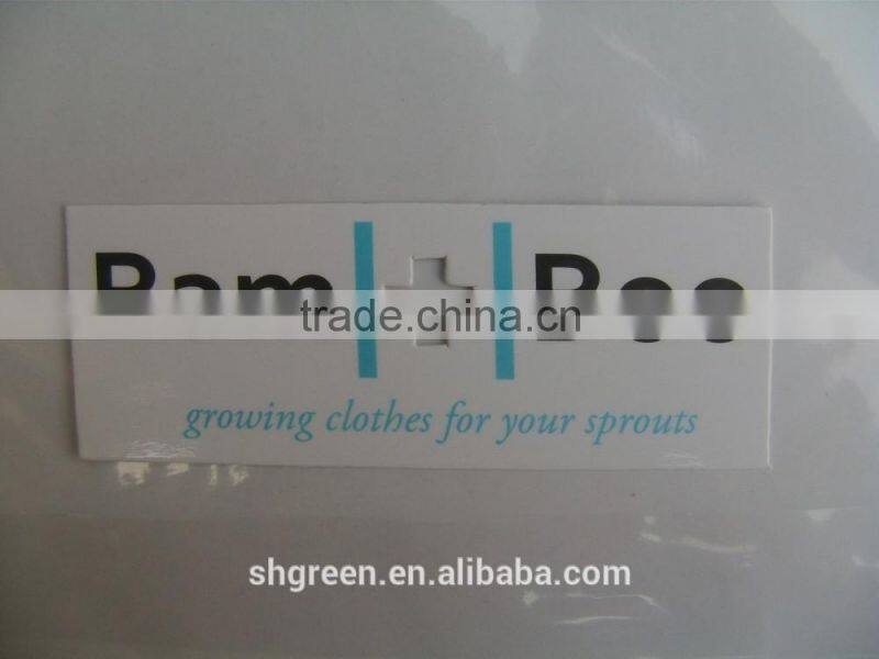 Glossy hole punched paper swing tags