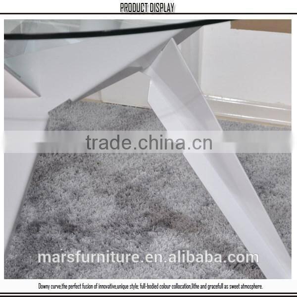 round glass table with metal legs