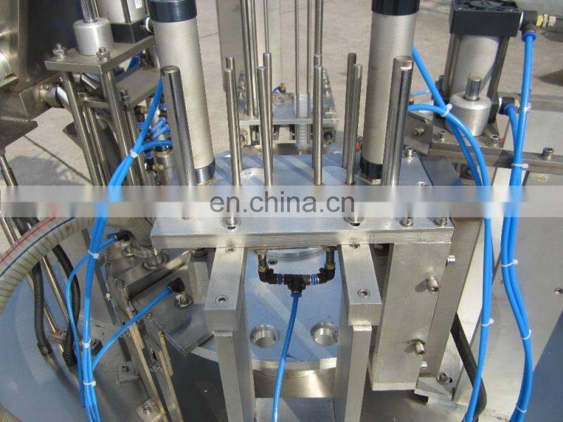Factory Price rotary Cup Filling and sealing Machine for sauce
