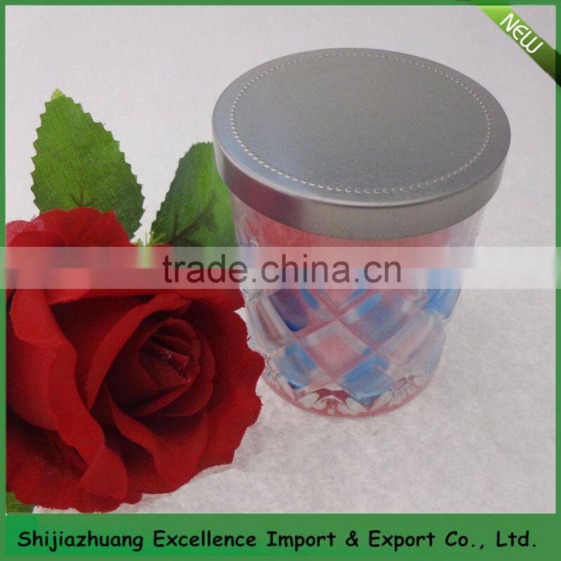 Scented candle in glass jar