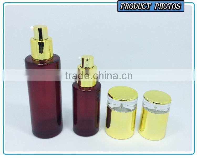 Cylinder RED coloured glass cosmetics bottles and face cream jars