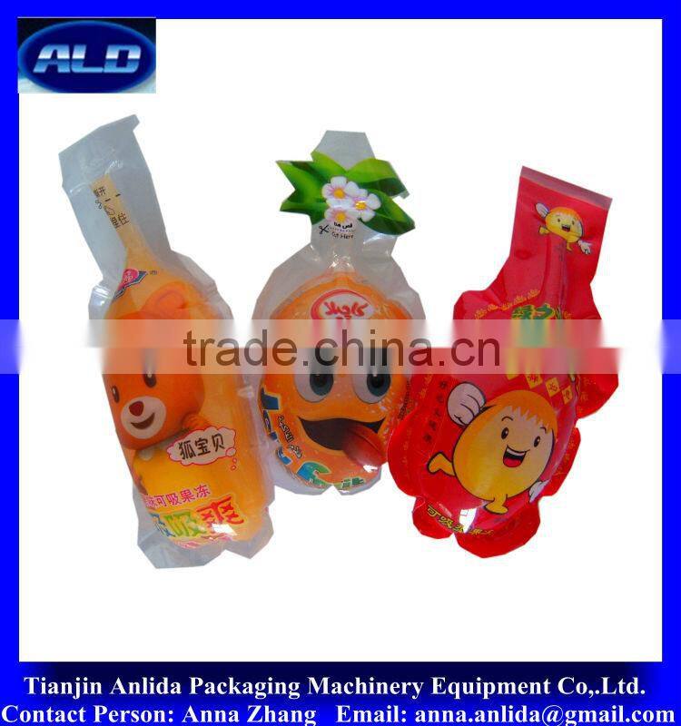 ice jelly stick in plastic soft fruit shape bag filling and sealing packing machine