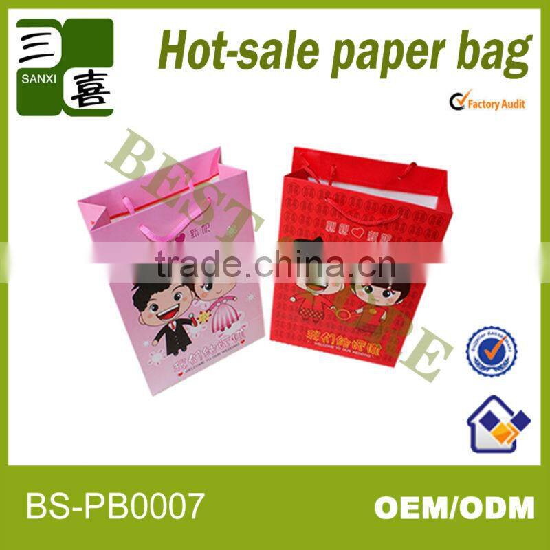 Glossy paper gift carry bag with ribbon rope