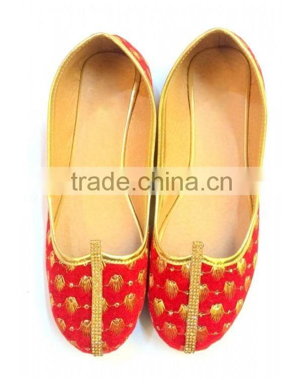 Embroidery Of Golden Zari And Golden Stones Covering The Whole Of Jutti