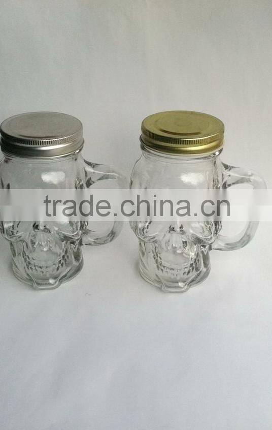 Skull head glass jars with handle and metal lid