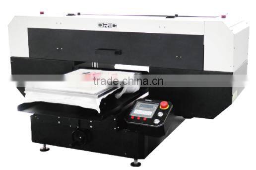 Oric small automatic direct to garment printer with Ricoh
