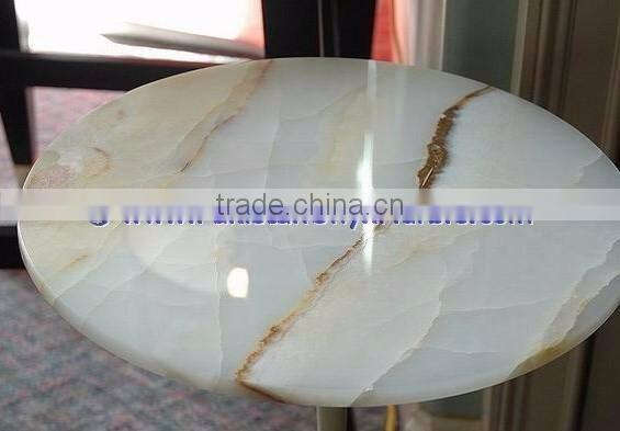 A GRADE LIGHT GREEN ONYX TABLE TOPS COLLECTION