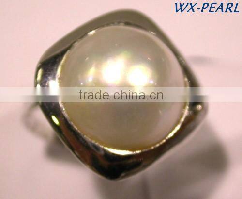 Cross charm ring and a tiny freshwater pearl ring Tahitian Pearl Ring