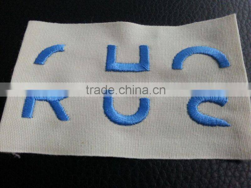 2015 high quality free machine embroidery label designs clothing label