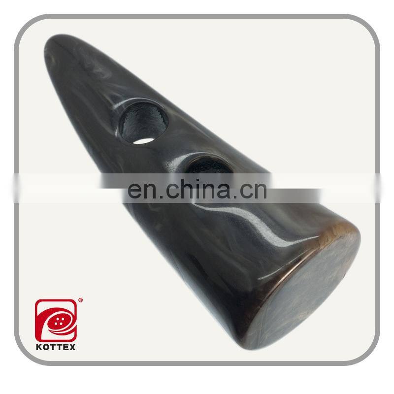 natural cow horns dark brown horn toggle button made of resin/polyester material