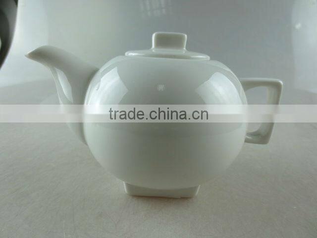 white round porcelain coffee and tea set
