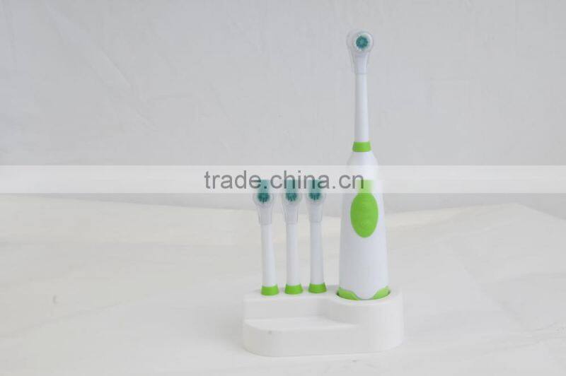 2015 kid waterproof battery powered electrical toothbrush with holder and replace head