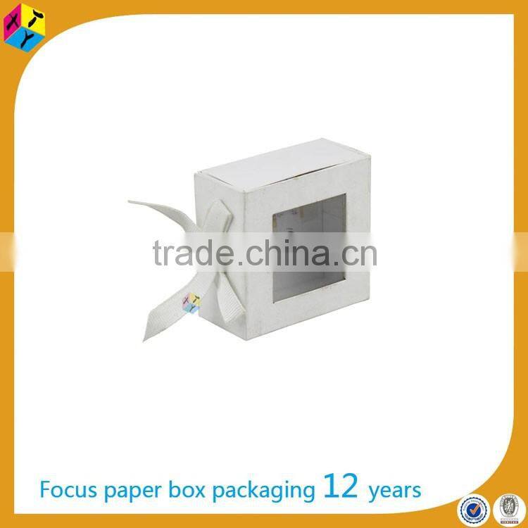 small white cardboard clear top gift boxes