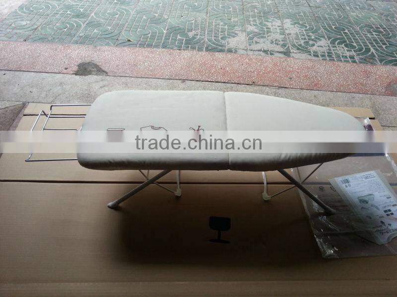 folding ironing board and ironing tabel in cupboard