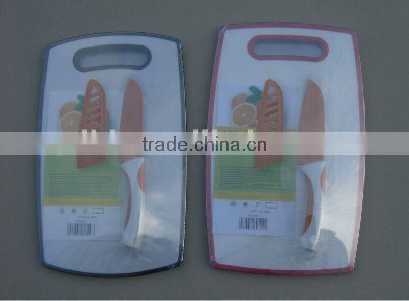 plastic cutting board and santoku knife