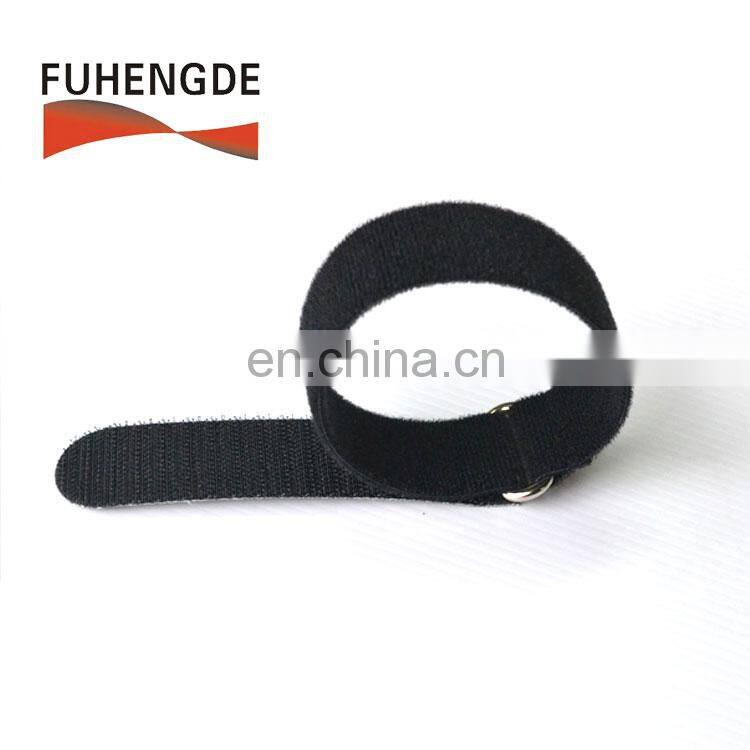 Reusable hook and loop strap with metal loop