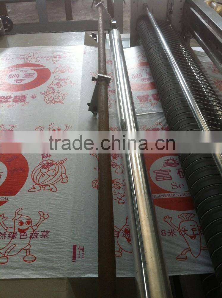 Economic type cake or bread oil on paper roll cutting machine