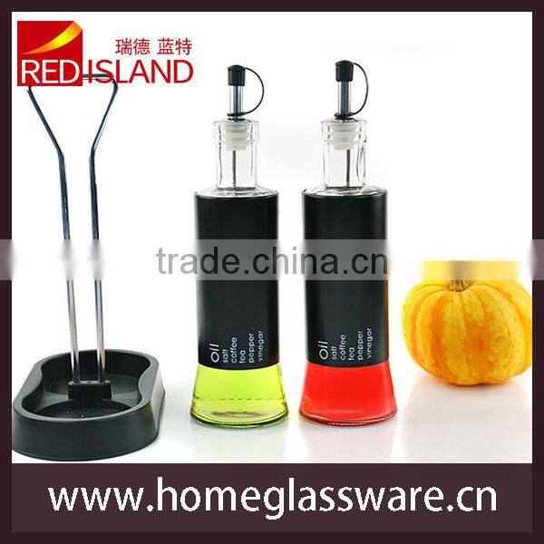 Round olive oil and vinegar bottle with coating and base