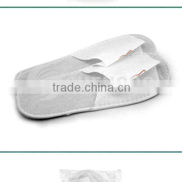 Disposable nonwoven slippers