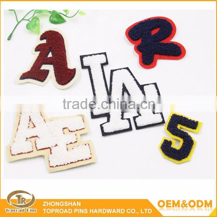 Wholesale clothes patches embroidered custom leatter design soft towel chenille patches letters