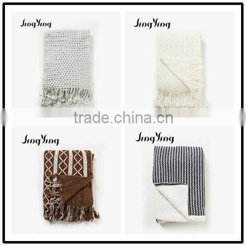 Hot sale orange color acrylic single side check jacquard crochet blanket with short tassels