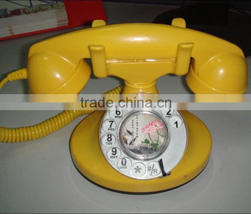 cute vintage landline telephone set with clock and display