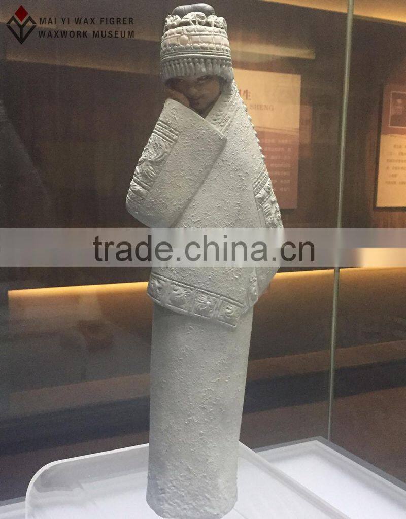 folk art sculpture of wax museum display