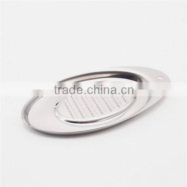 Spoon shaped ginger chocolate nutmeg garlic grater