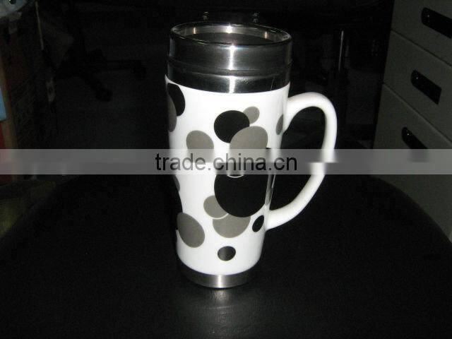 Double wall ceramic travel mug with stainless steel inner