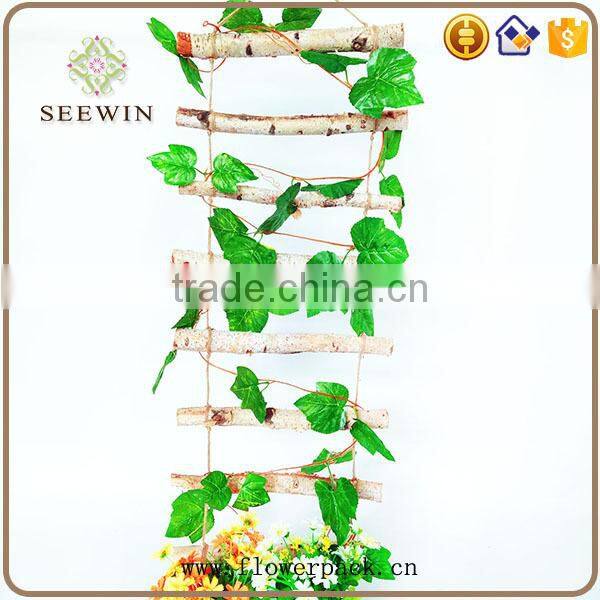 The rural custom festival decorates birch hemp rope ladder