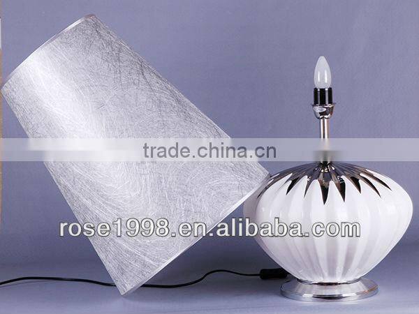 white porcelain and silver shade table lamp