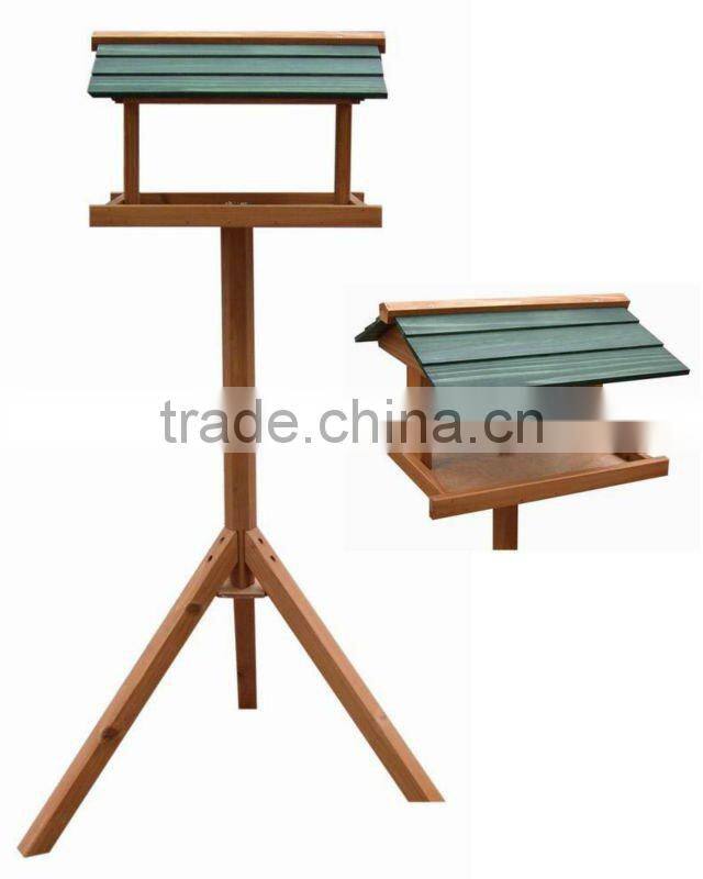 Outside small wooden letter box bird house