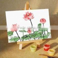 Small wooden easel for canvas painting
