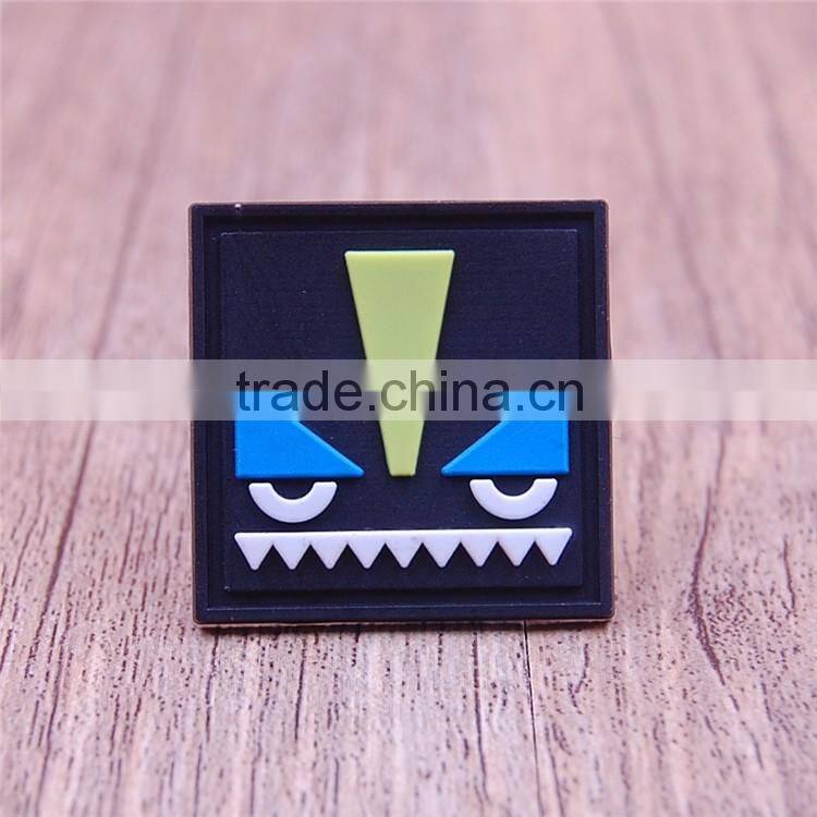 Custom cheap square shape pvc labels for brand clothing handbags