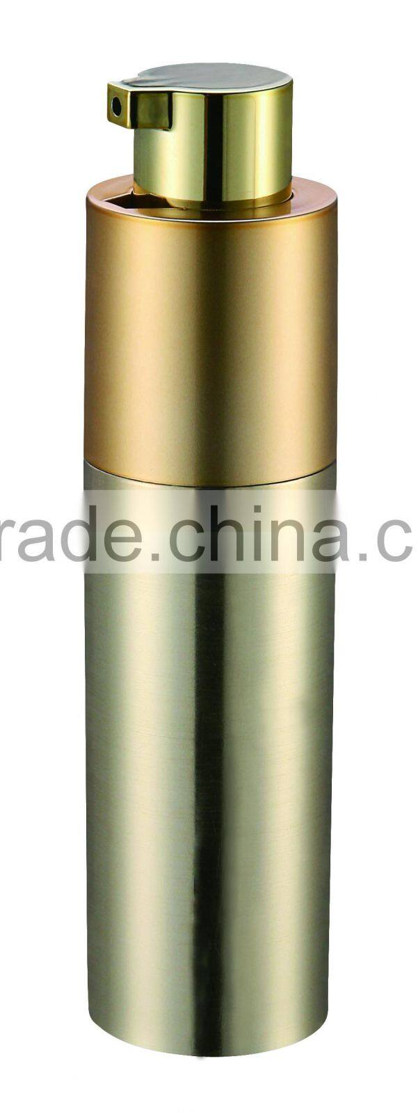 golden metal clothed airless bottle