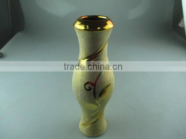beautiul golden porcelain type vase with flower design