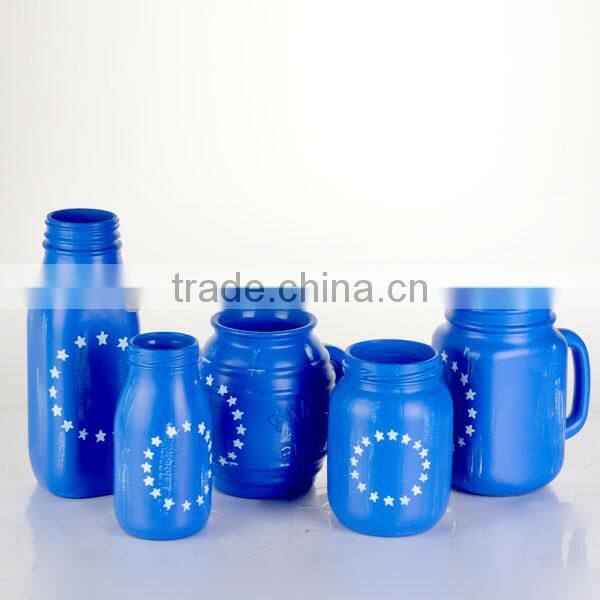 colorful glass vases with sunflower decor