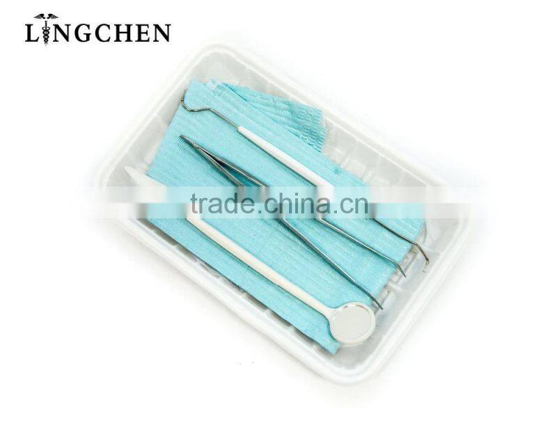 High quality Dental disposable package set have colorful waterproof dental bib,mouth mirror , probe, tweezer