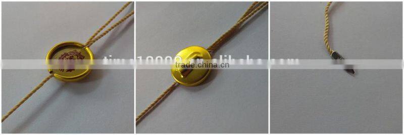 Cheap high-grade environmental protection non-toxic gilt metal plastic seal tag /plastic string tag c string thong pictures