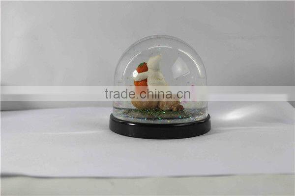 Plastic pumpkin halloween snow globe