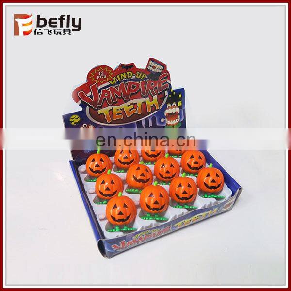 Cute wind up jump pumpkin toy