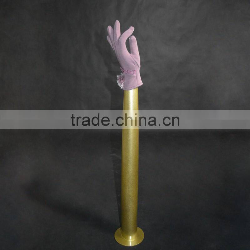Fashion jewelry and gloves display female mannequin hand