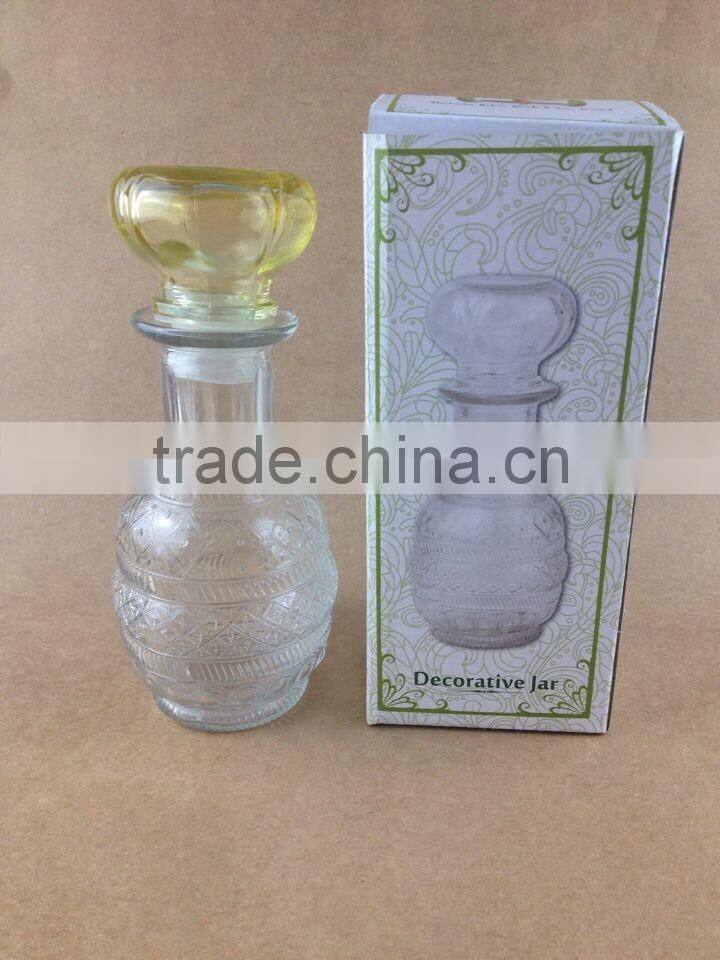 clear body yellow lid glass diffuser bottle