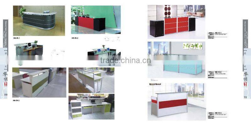 Black tufted reception desk made with tempered glass