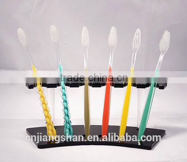 small plastic toothbrush one time use