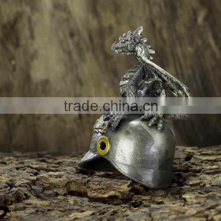 Pewter dragon with helmet figurine