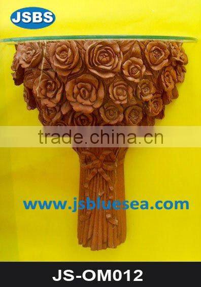 cherub carving garden wall ornament