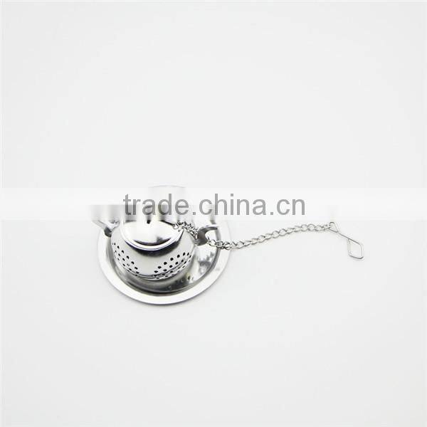 Small stainless steel teapot shaped strainer