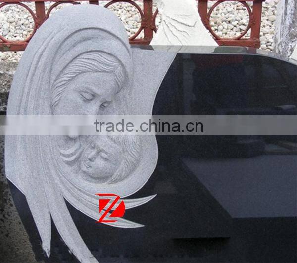 cemetery headstone tombstone with mary and baby head